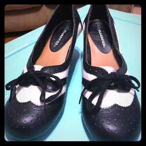 Black and white saddle shoes style heel